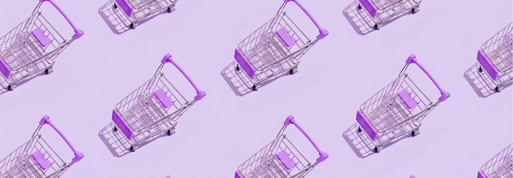 Light purple background with images of shopping carts in a pattern
