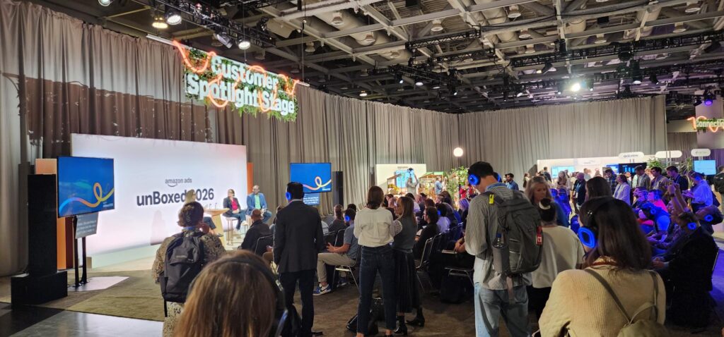 A photo of someone speaking on stage at Amazon unBoxed 2026